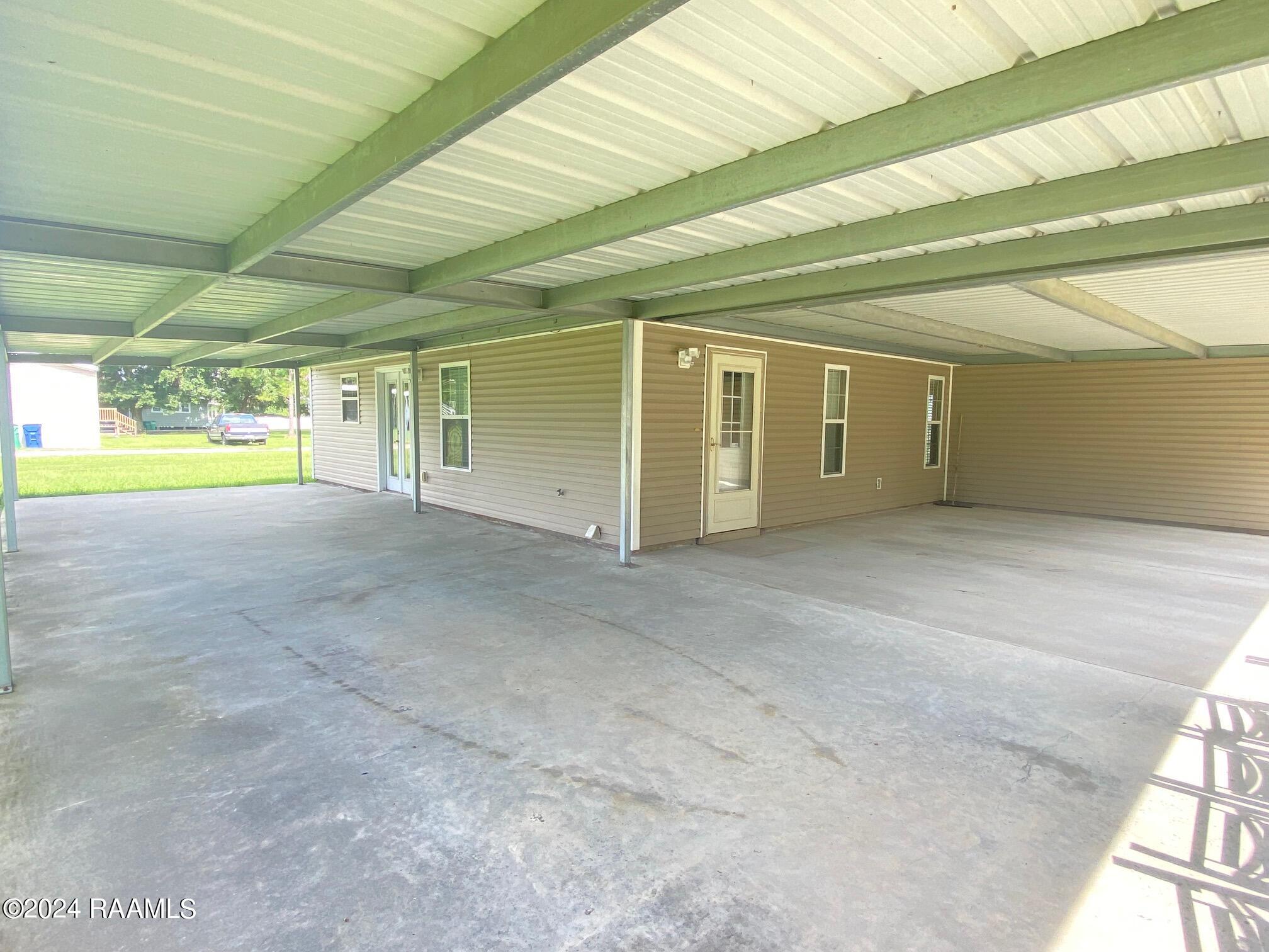 353 Welch Road Rayne, LA 70578 - Photo 30 of 37 carport/patio