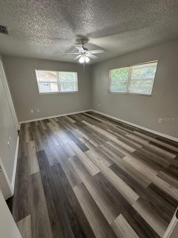 8085 Omaha Circle Spring Hill, FL 34606 - Photo 13 of 18 a view of empty room with window