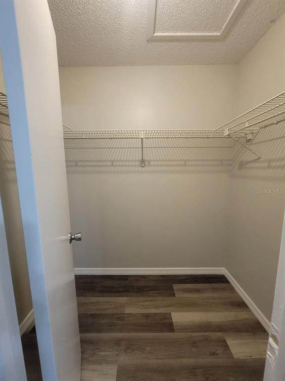 8085 Omaha Circle Spring Hill, FL 34606 - Photo 9 of 18 a view of small space with racks on the wall