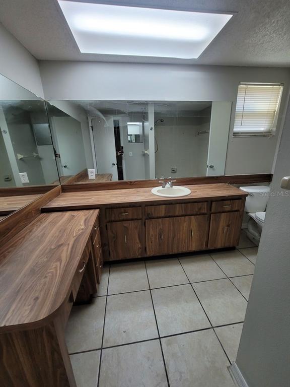 8085 Omaha Circle Spring Hill, FL 34606 - Photo 10 of 18 a room with a sink and cabinets