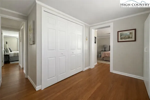 a view of a room with wooden floor bathroom and bathroom