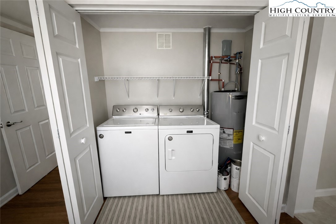 230 Beaver Creek Road West Jefferson, NC 28694 - Photo 17 of 20 a view of a storage & utility room with washer and dryer
