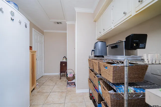 a room with furniture and a flat screen tv