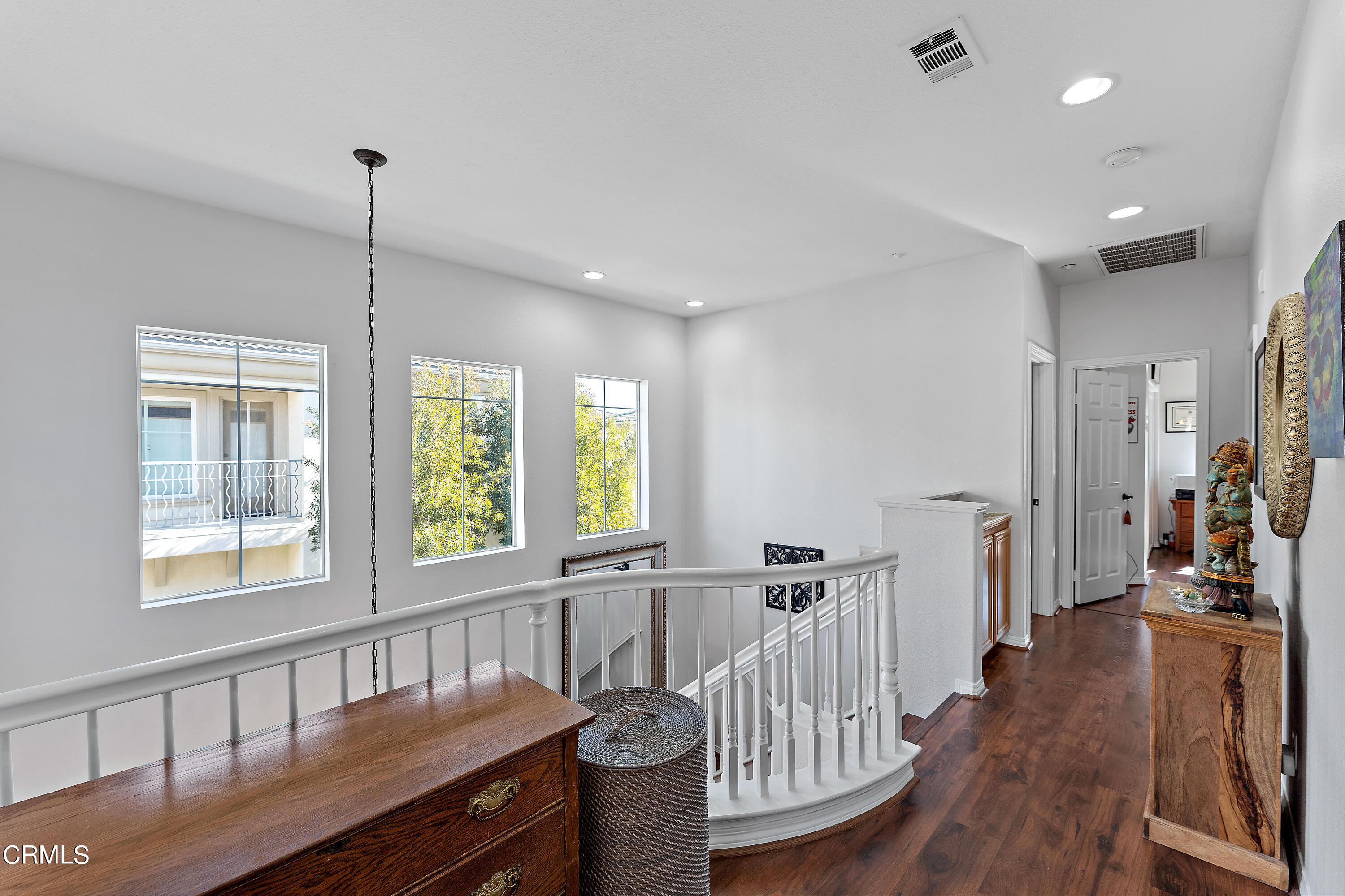 1239 Bayside Lane Oxnard, CA 93035 - Photo 14 of 27 a view of a dining room with furniture window and wooden floor