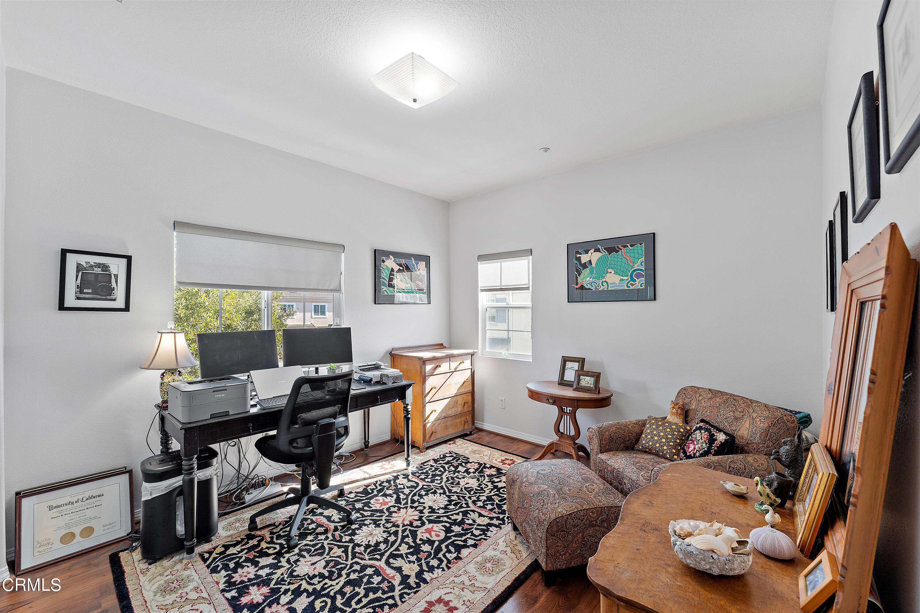 1239 Bayside Lane Oxnard, CA 93035 - Photo 15 of 27 a living room with furniture and a window