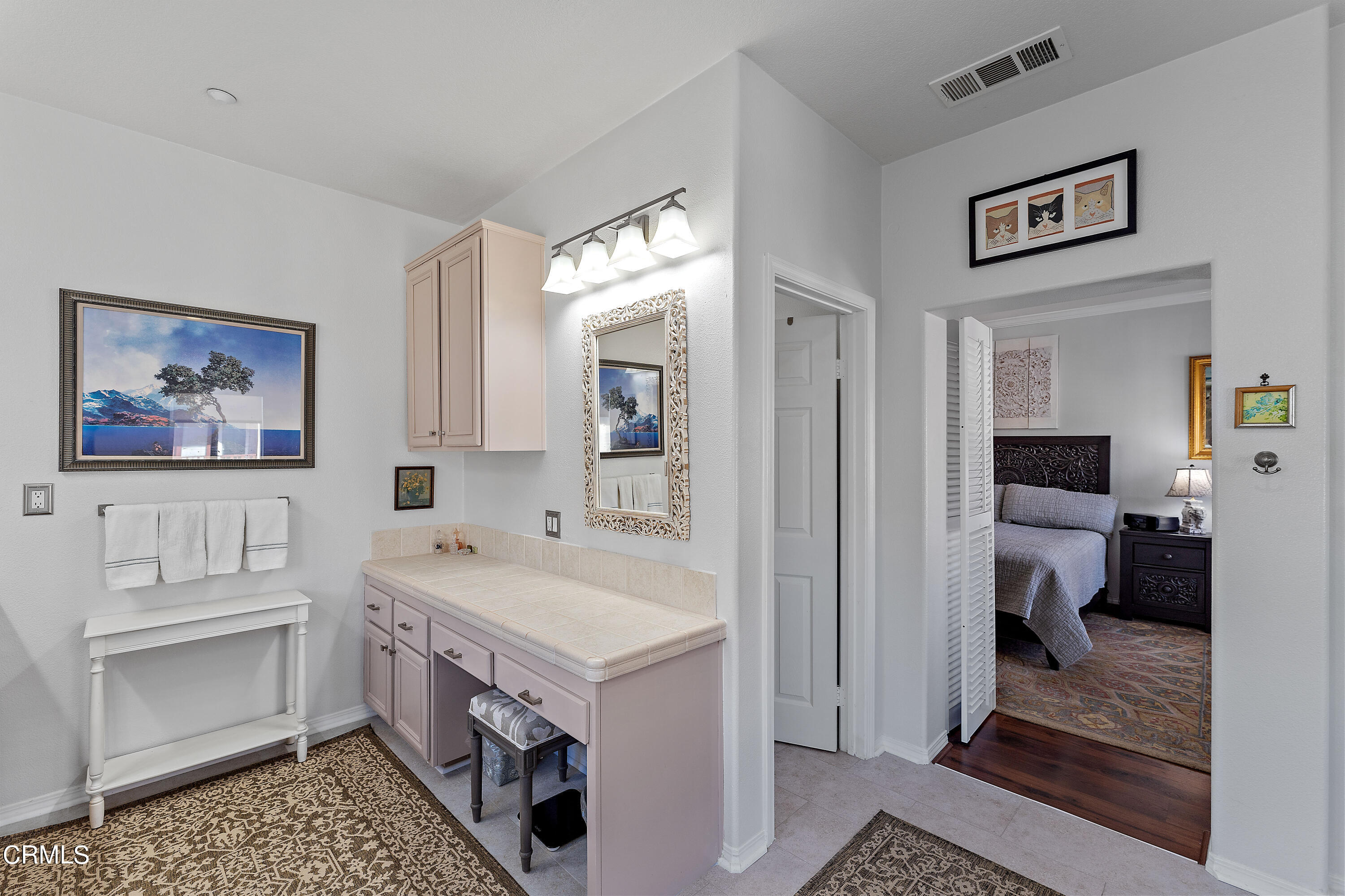 1239 Bayside Lane Oxnard, CA 93035 - Photo 22 of 27 a view of a hallway with bathroom and a bath tub
