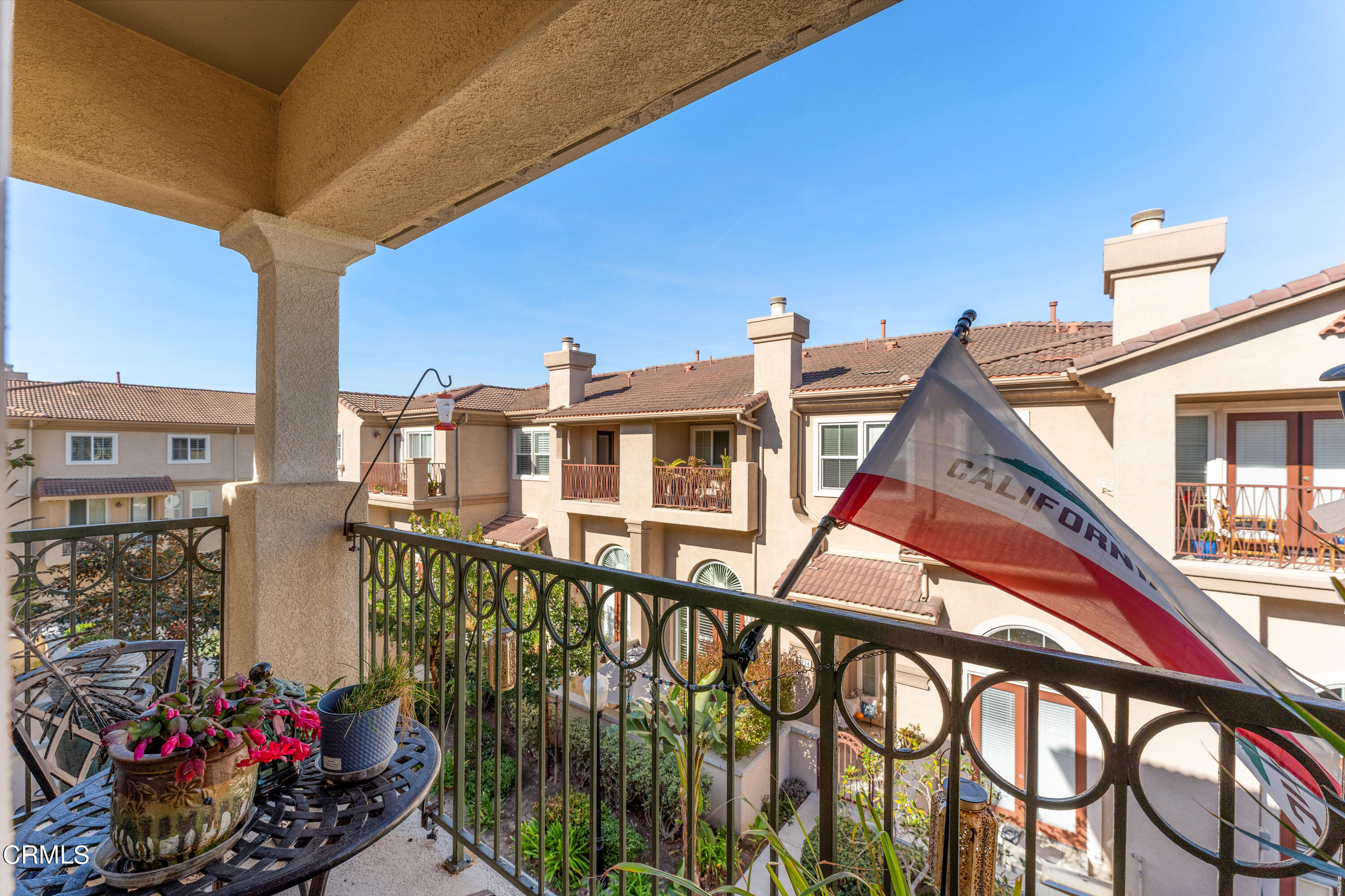 1239 Bayside Lane Oxnard, CA 93035 - Photo 23 of 27 a front view of a house with a yard