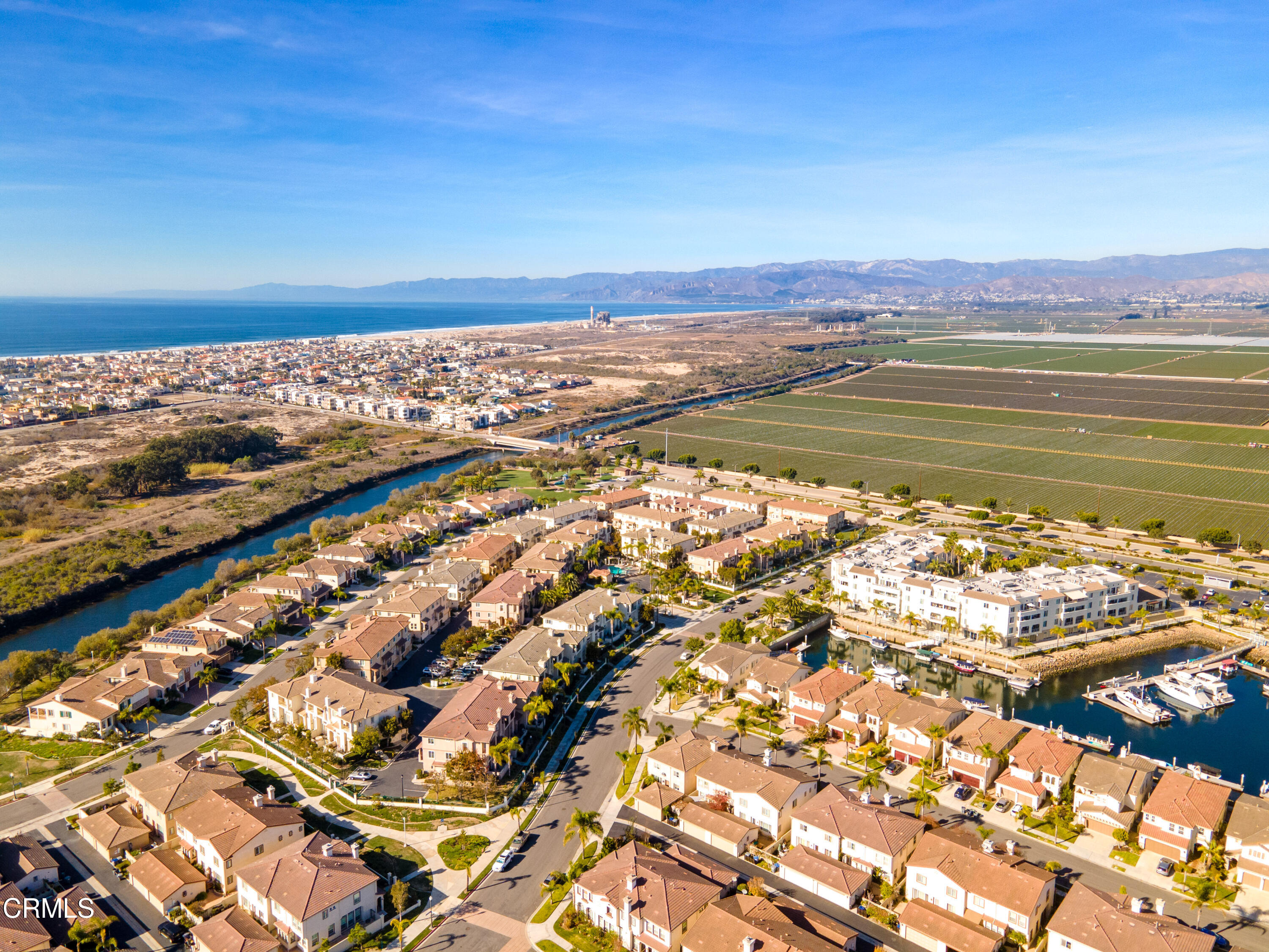 1239 Bayside Lane Oxnard, CA 93035 - Photo 26 of 27 a view of an ocean and a mountain