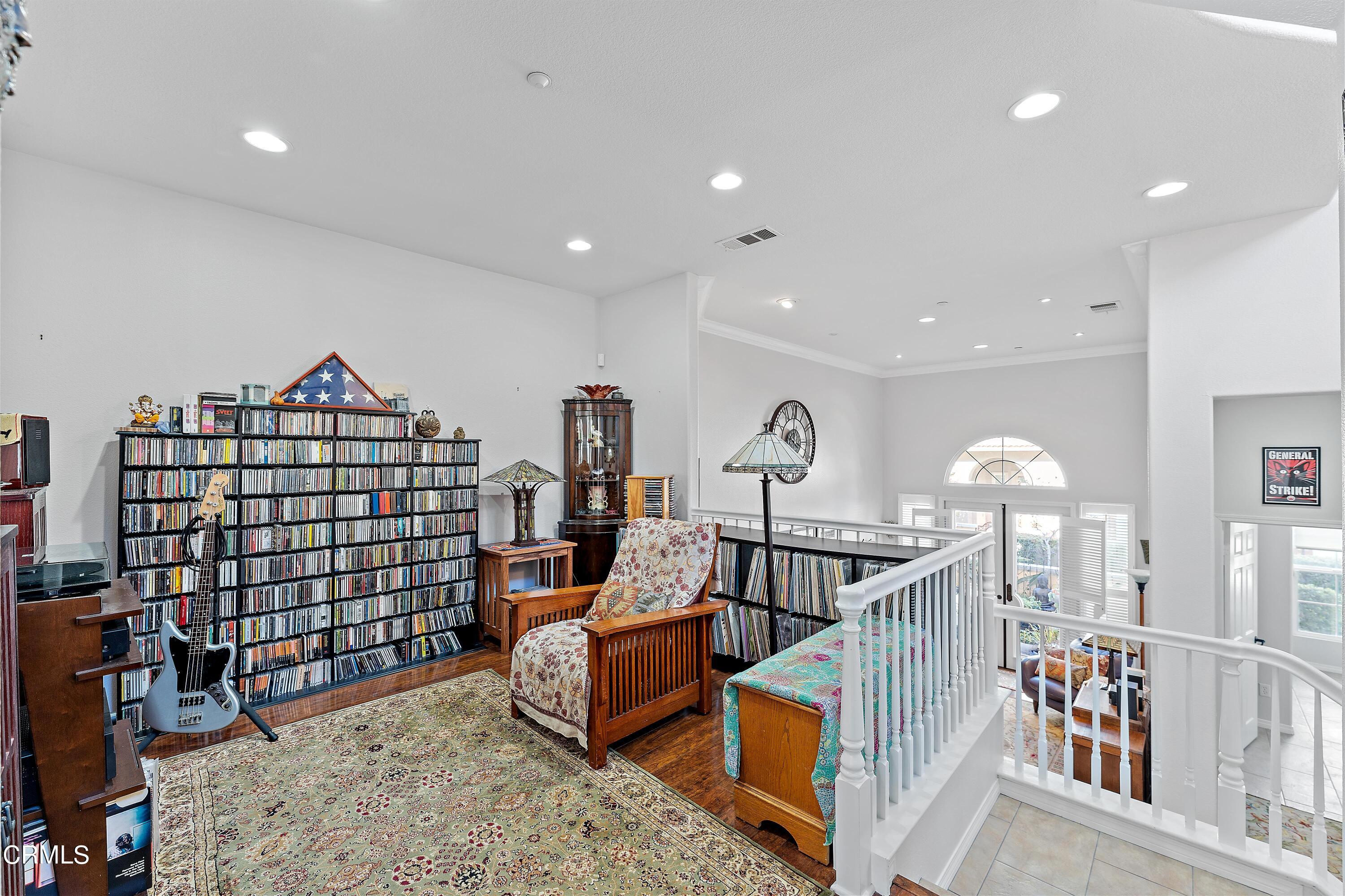 1239 Bayside Lane Oxnard, CA 93035 - Photo 6 of 27 a view of staircase with furniture and rug