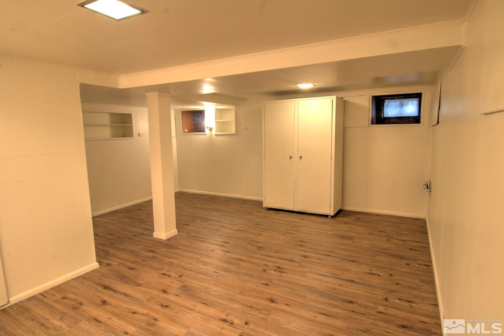 440 East 8th Street Reno, NV 89512 - Photo 13 of 23 a view of a hallway with wooden floor