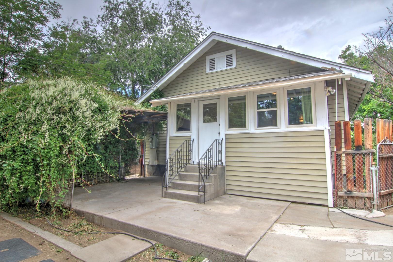 440 East 8th Street Reno, NV 89512 - Photo 15 of 23 a view of a house with a yard