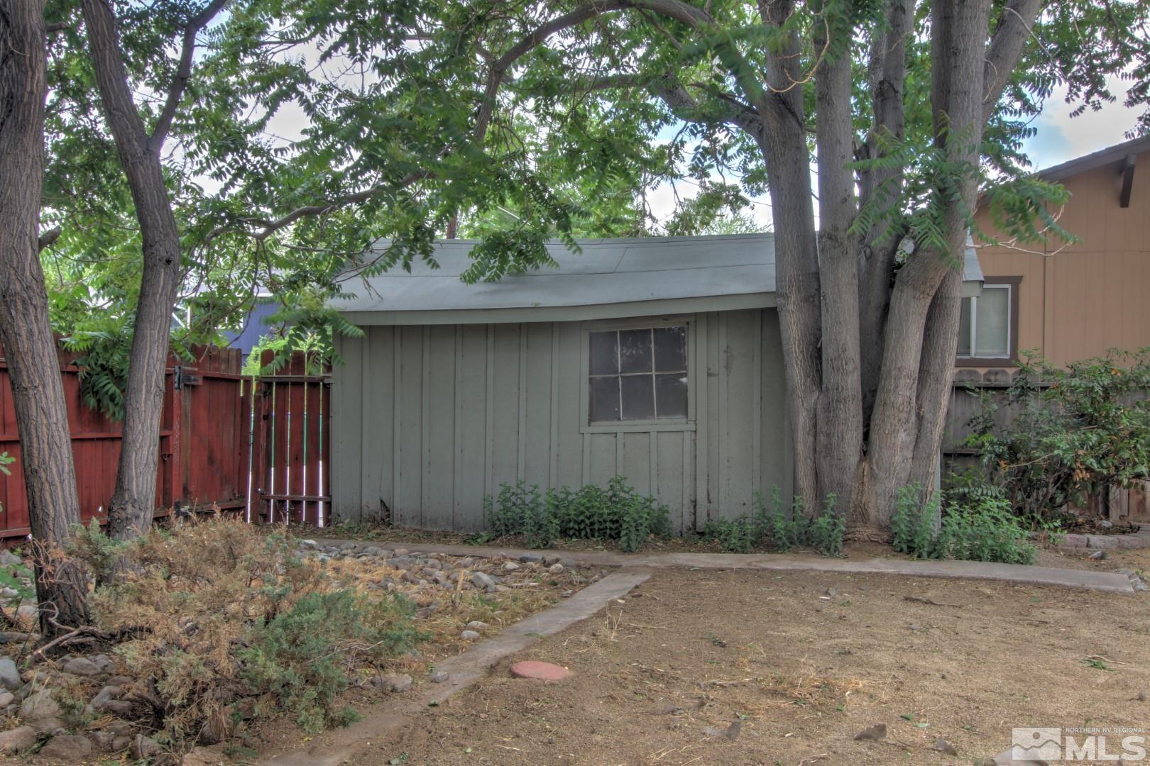 440 East 8th Street Reno, NV 89512 - Photo 20 of 23 a front view of house with yard and trees