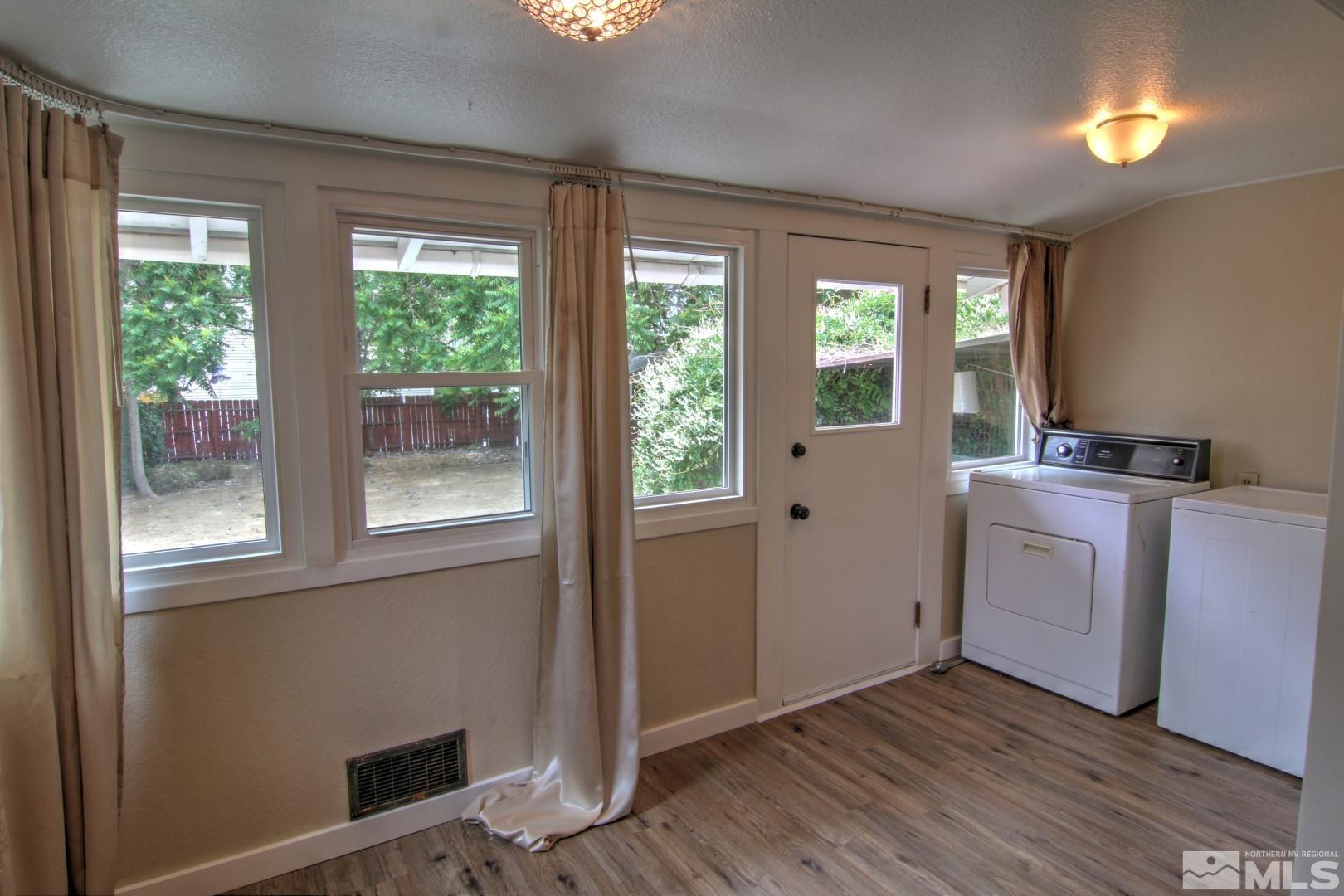 440 East 8th Street Reno, NV 89512 - Photo 7 of 23 a view of a kitchen with dishwasher and wooden floor