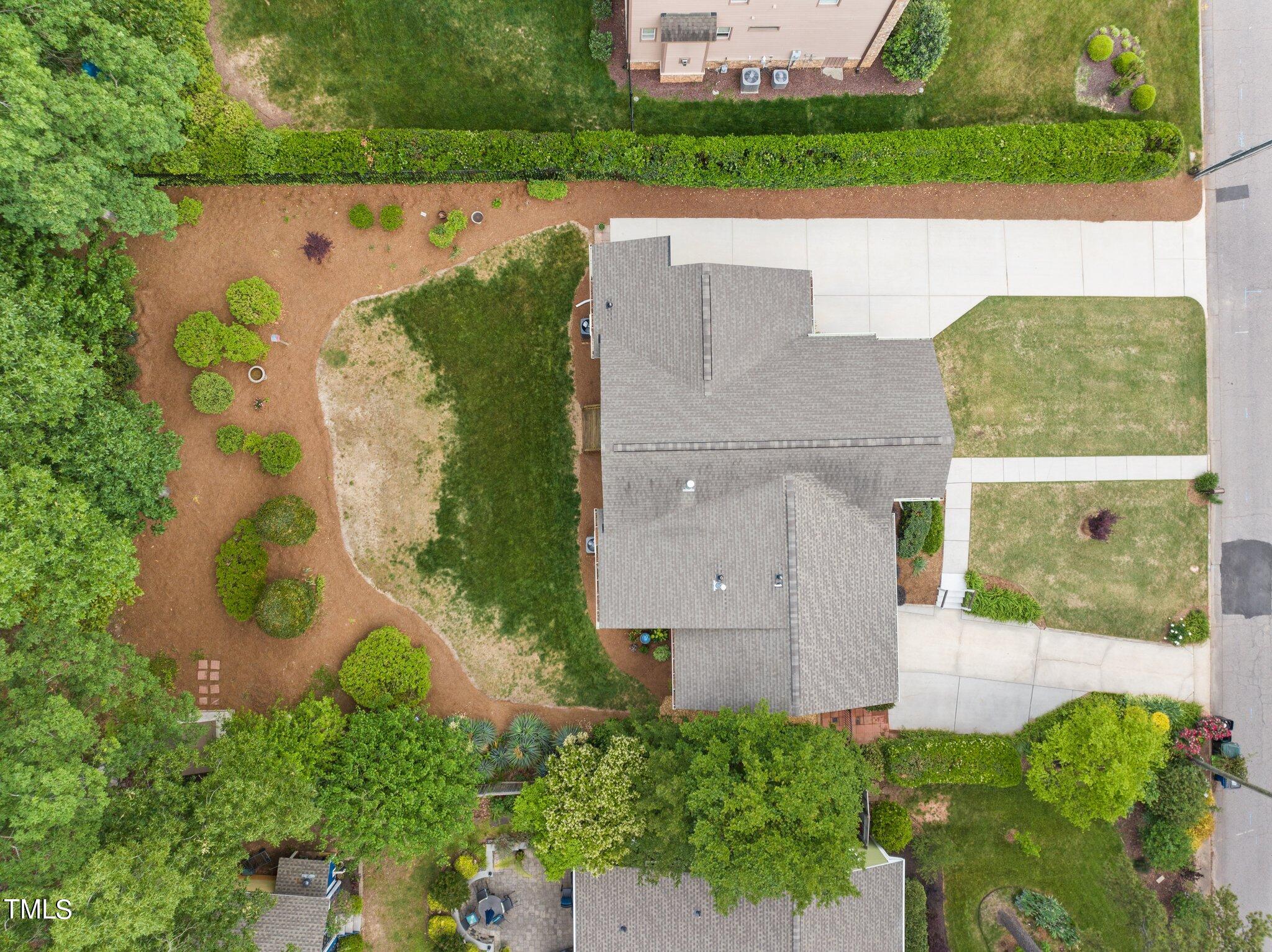 1110 Dogwood Lane Raleigh, NC 27607 - Photo 35 of 46 .32 acre with spacious backyard with natural area with azaleas, sasanquas, gardenias, bulbs, Japanese maple and more.