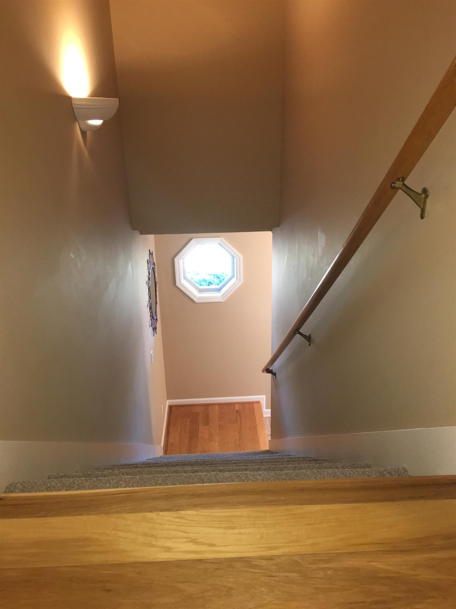 1147 Simms Heights Road Kingston Springs, TN 37082 - Photo 12 of 30 Looking down the staircase from the upstairs hallway