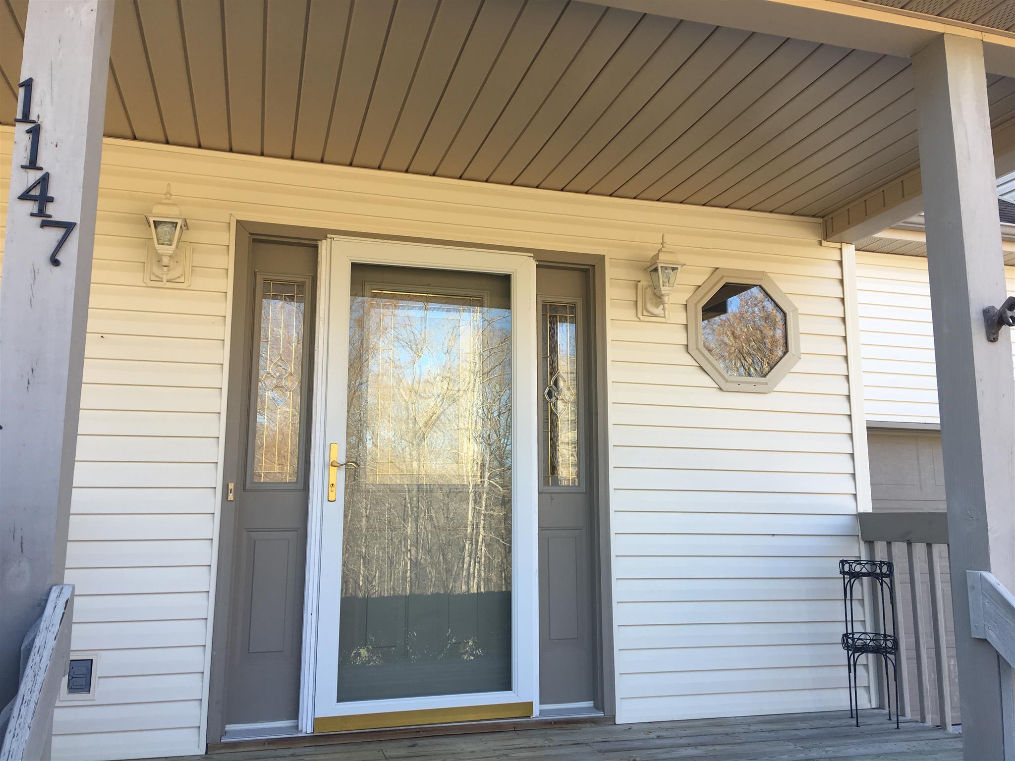 1147 Simms Heights Road Kingston Springs, TN 37082 - Photo 4 of 30 Beautiful front door with storm door attached.