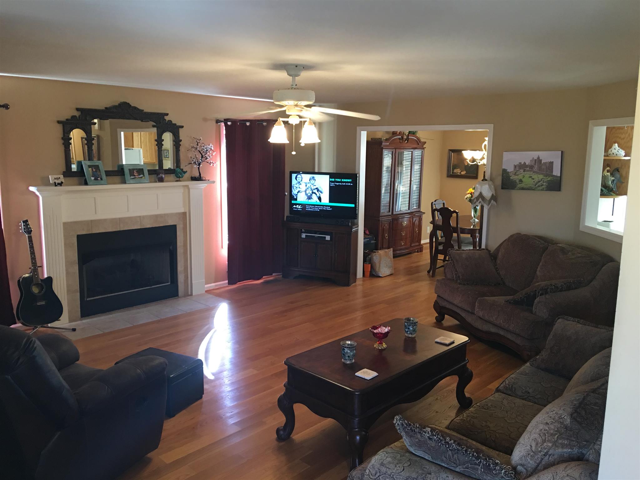 1147 Simms Heights Road Kingston Springs, TN 37082 - Photo 5 of 30 Living Room with gas fireplace and tons of natural light. Picture taken from entry Foyer