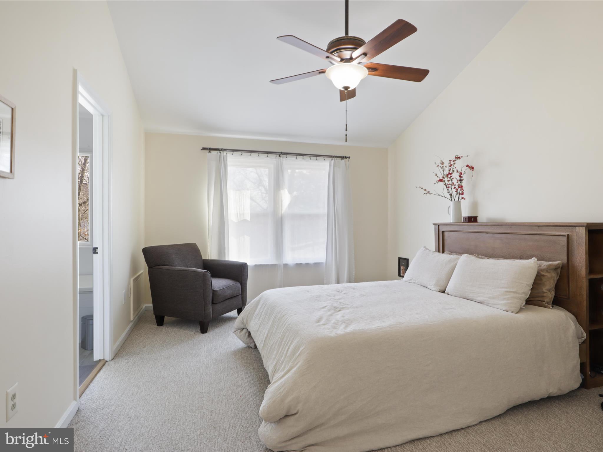 3906 Elbert Avenue Alexandria, VA 22305 - Photo 15 of 40 a bedroom with bed couch and window