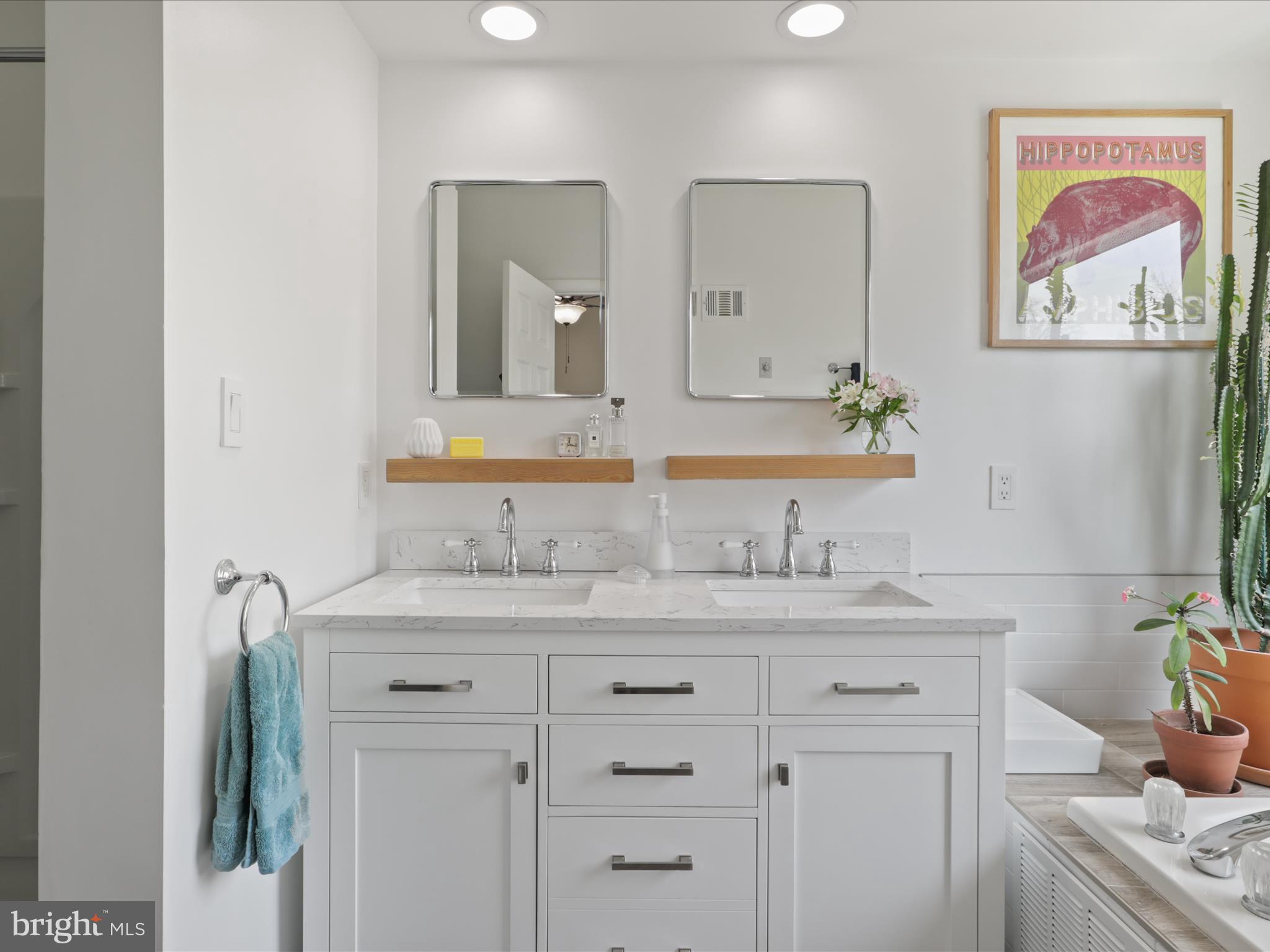 3906 Elbert Avenue Alexandria, VA 22305 - Photo 18 of 40 a bathroom with a granite countertop sink and a mirror