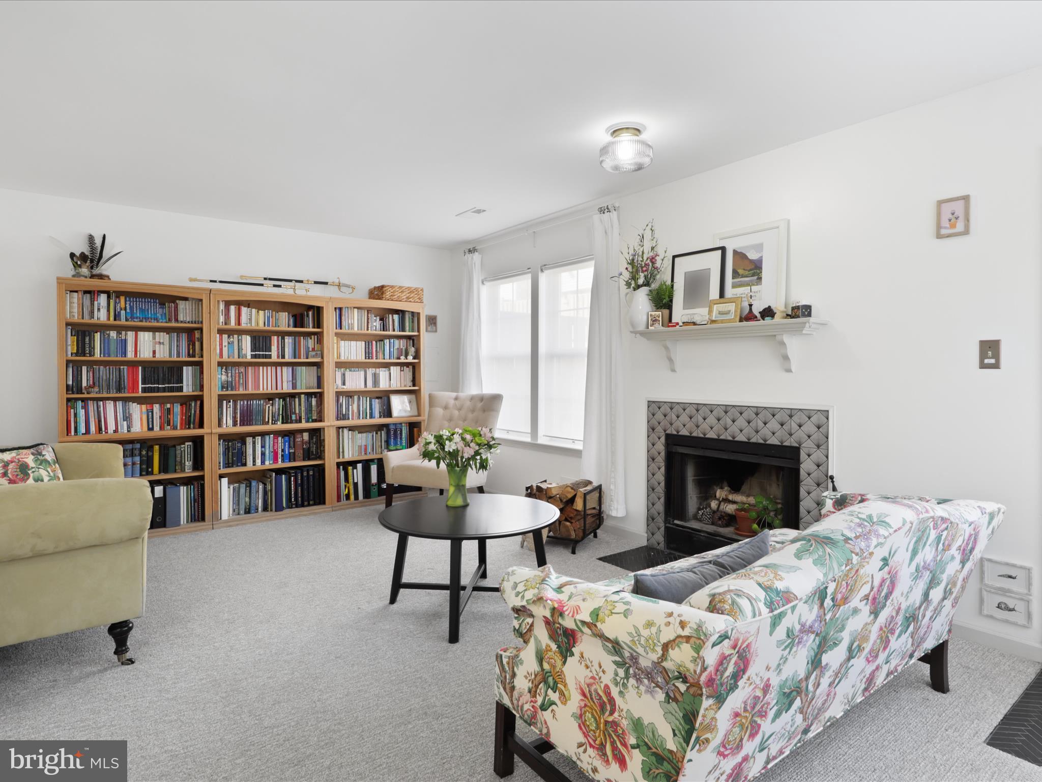 3906 Elbert Avenue Alexandria, VA 22305 - Photo 27 of 40 a living room with furniture and a fireplace