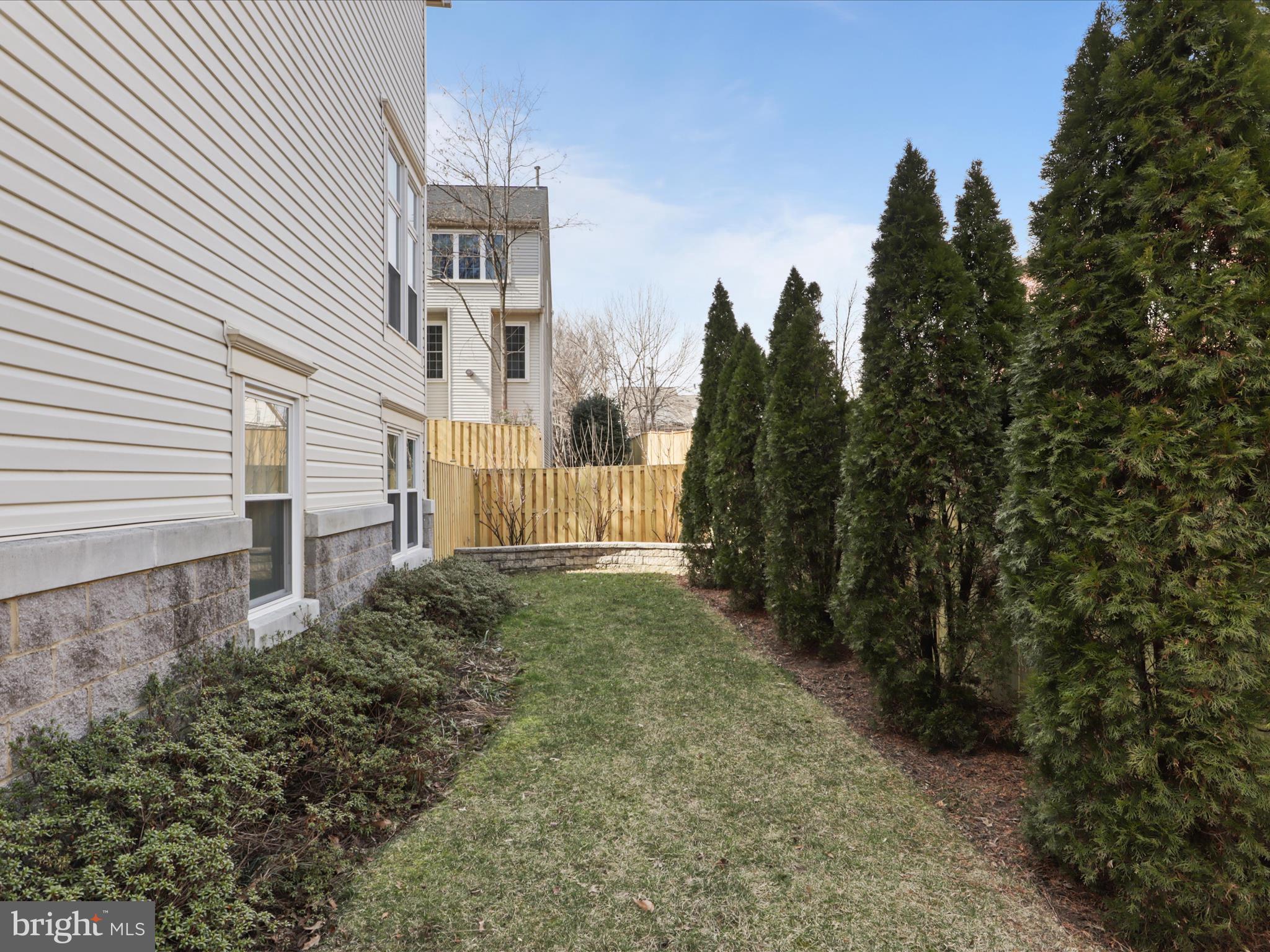 3906 Elbert Avenue Alexandria, VA 22305 - Photo 33 of 40 a view of a house with a yard