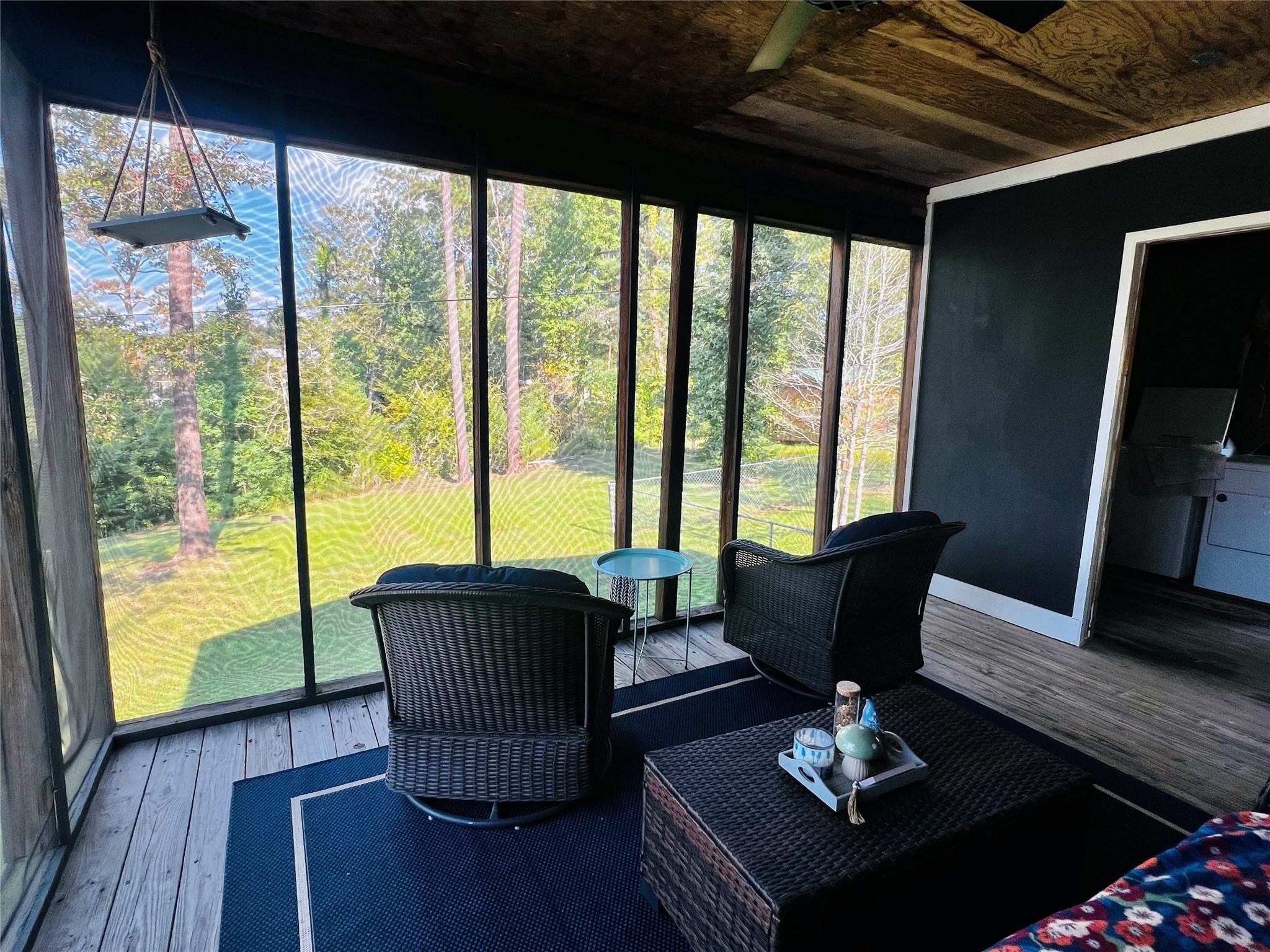 523 Beechridge Loop Hemphill, TX 75948 - Photo 16 of 18 a living room with furniture and a floor to ceiling window