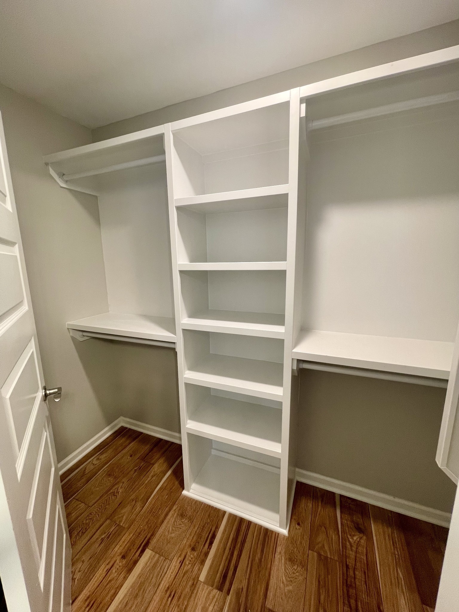 208 Power Avenue, Unit D Murfreesboro, TN 37129 - Photo 12 of 14 a view of walk in closet with empty racks