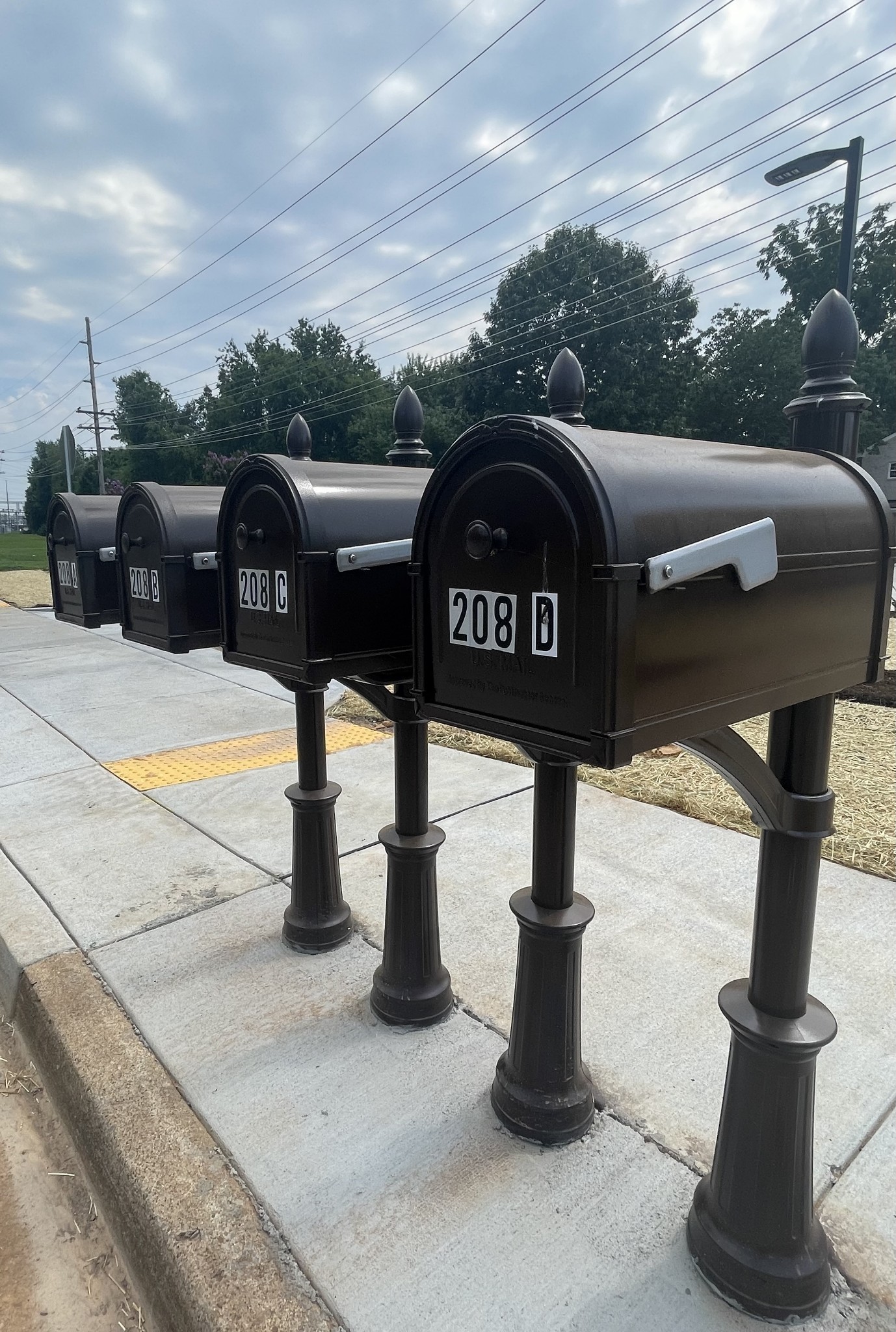208 Power Avenue, Unit D Murfreesboro, TN 37129 - Photo 2 of 14 a front view of a house with garden