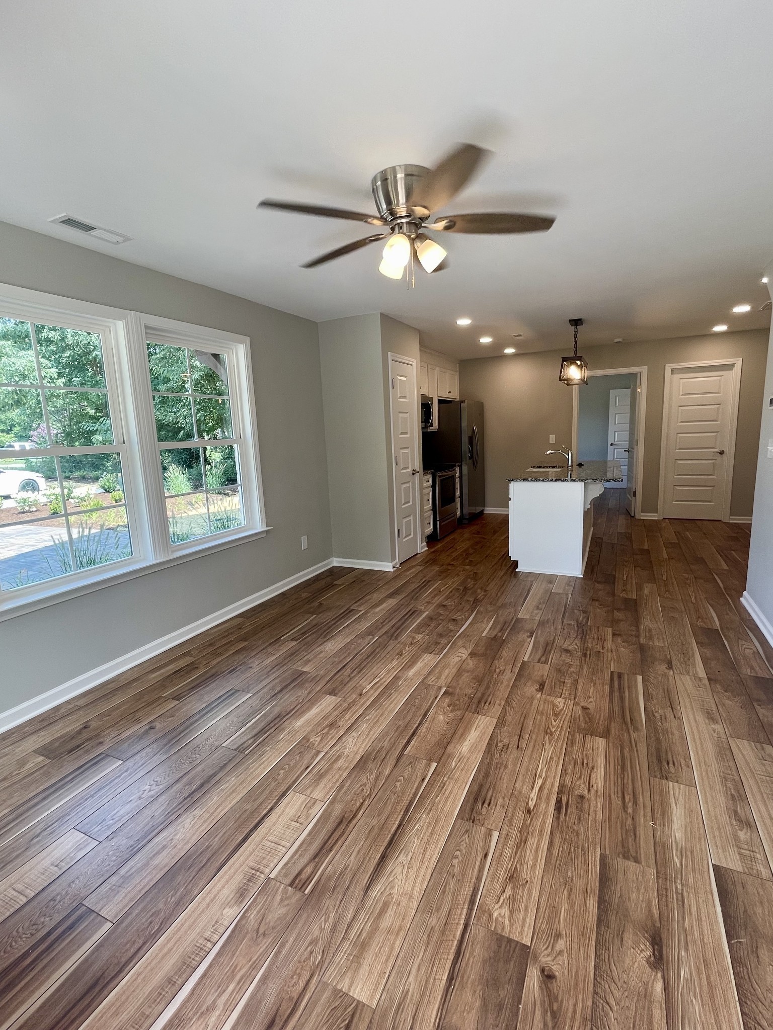 208 Power Avenue, Unit D Murfreesboro, TN 37129 - Photo 3 of 14 a view of kitchen with cabinets and wooden floor