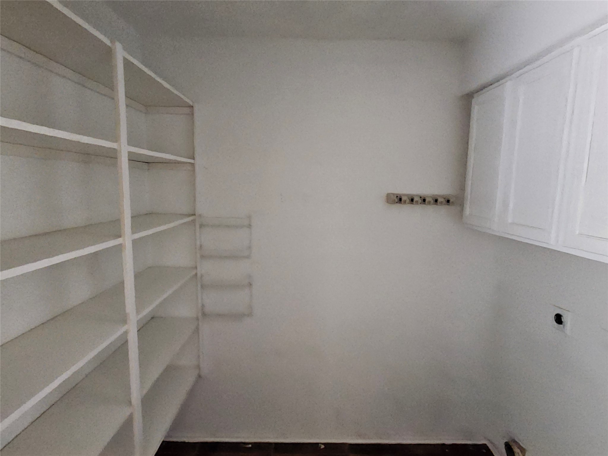 4672 Mather Kyle, TX 78640 - Photo 11 of 28 a view of walk in closet with empty racks