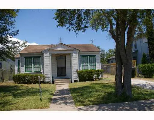 a view of a house with a garden