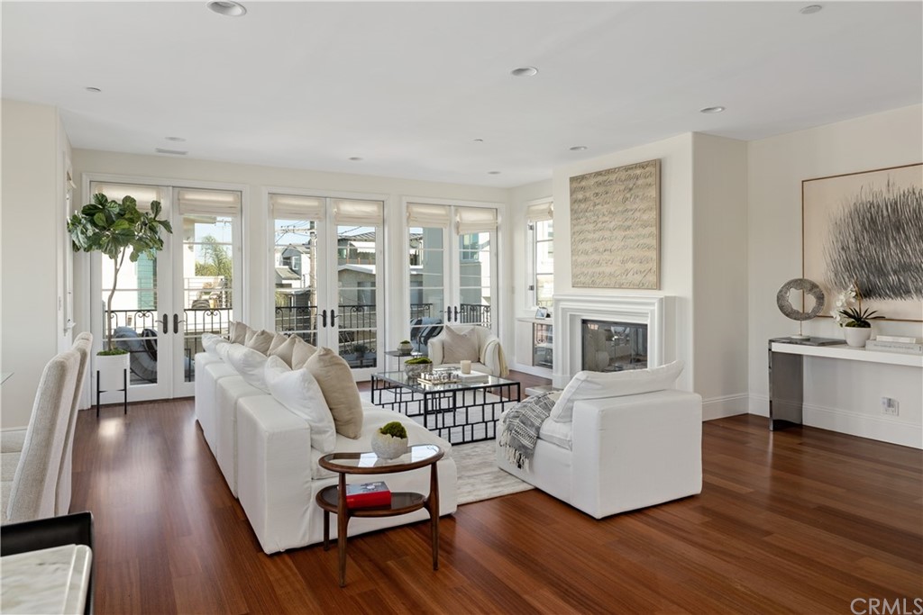 2211 Vista Drive Manhattan Beach, CA 90266 - Photo 11 of 48 a living room with furniture and a large window