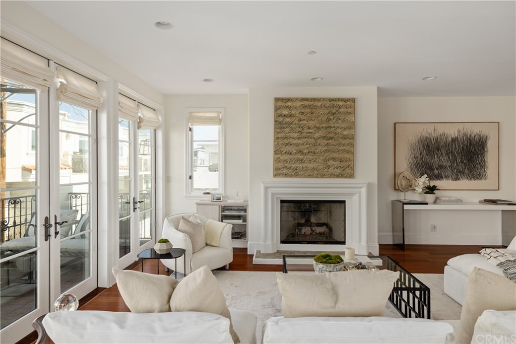 2211 Vista Drive Manhattan Beach, CA 90266 - Photo 12 of 48 a living room with furniture and a fireplace