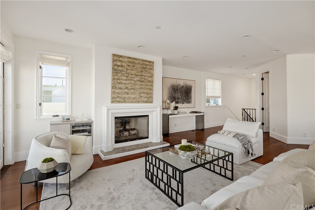 2211 Vista Drive Manhattan Beach, CA 90266 - Photo 17 of 48 a living room with furniture and a fireplace
