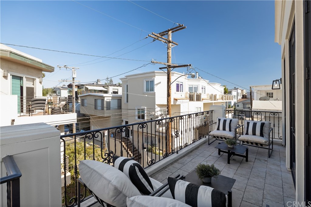 2211 Vista Drive Manhattan Beach, CA 90266 - Photo 19 of 48 a view of a chairs and tables in the balcony