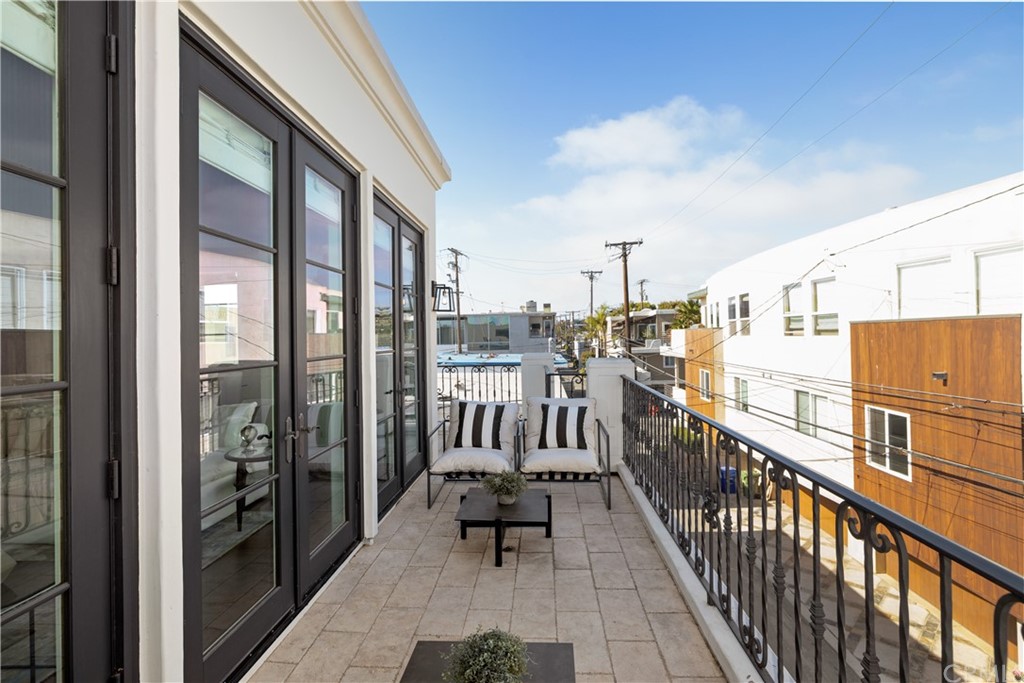 2211 Vista Drive Manhattan Beach, CA 90266 - Photo 20 of 48 a view of a balcony with furniture