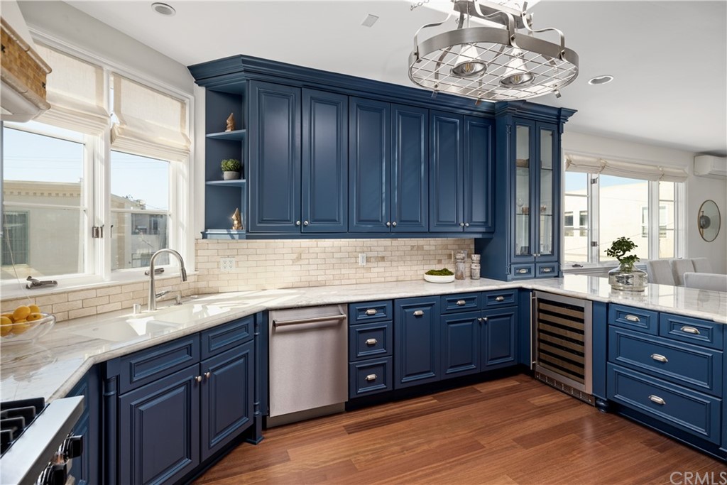 2211 Vista Drive Manhattan Beach, CA 90266 - Photo 30 of 48 a kitchen with a sink and cabinets