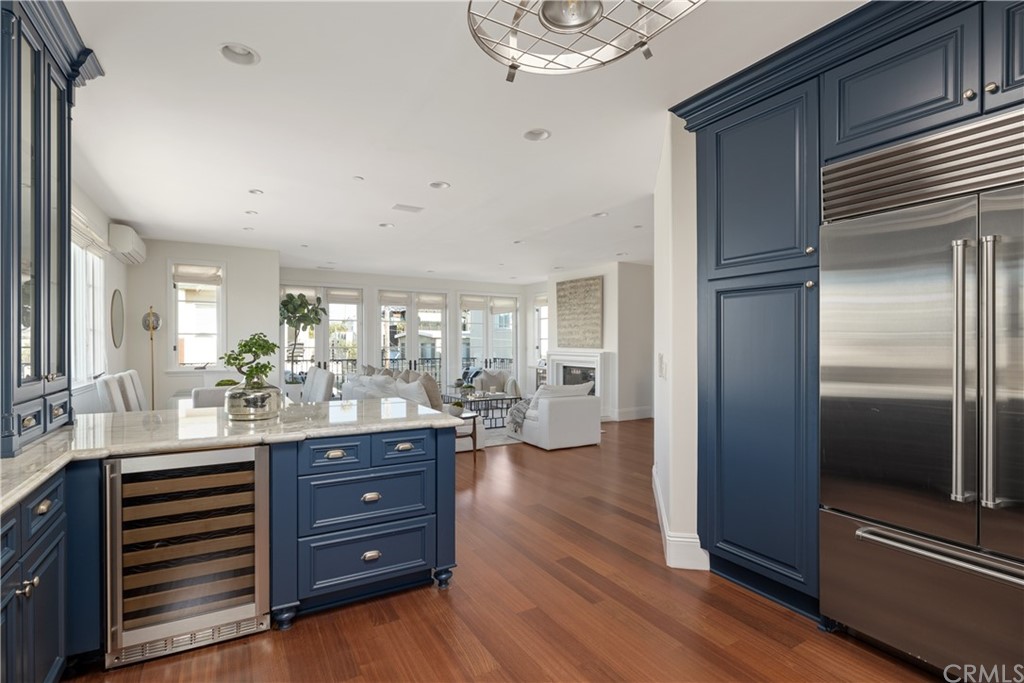 2211 Vista Drive Manhattan Beach, CA 90266 - Photo 32 of 48 a room with lots of wooden furniture and mirrors