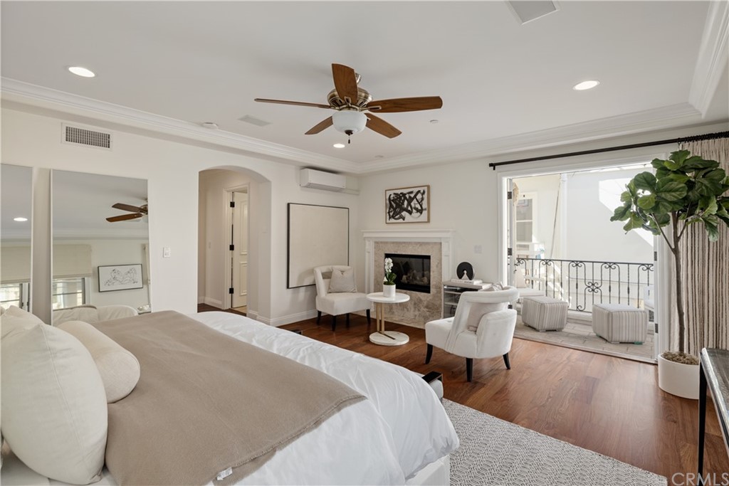 2211 Vista Drive Manhattan Beach, CA 90266 - Photo 35 of 48 a bedroom with furniture and a fireplace