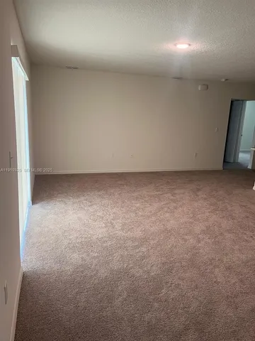 an empty room with a natural light