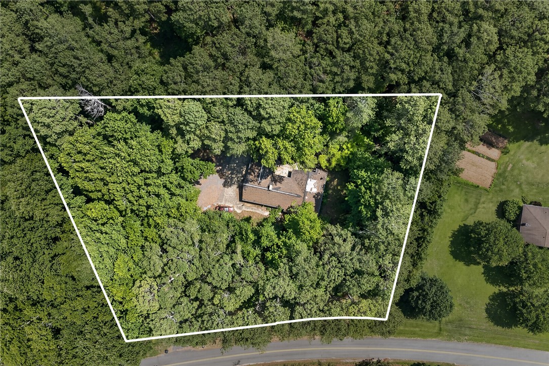 123 Robin Road Westminster, SC 29693 - Photo 45 of 50 An aerial perspective showcases a secluded home nestled within a dense canopy of mature trees.