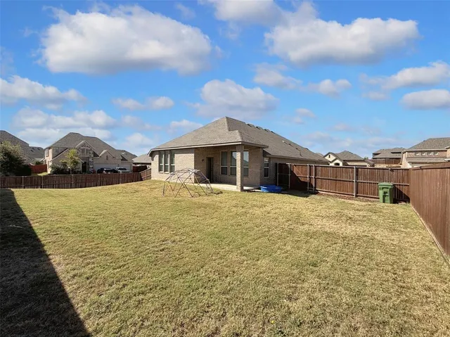a view of swimming pool with a lounge chair