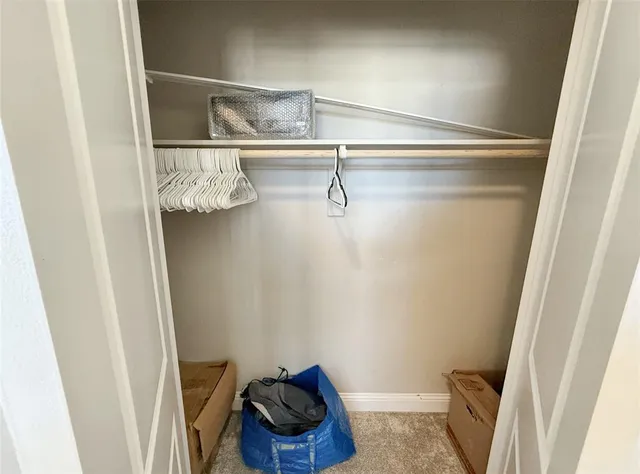 a room with a walk in closet