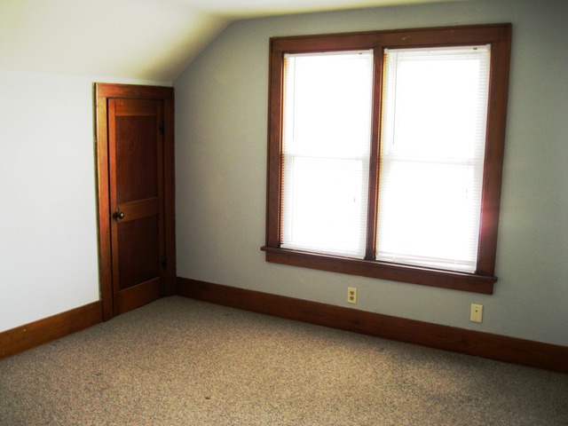 8720 Elva Road DeKalb, IL 60115 - Photo 12 of 25 an empty room with a window