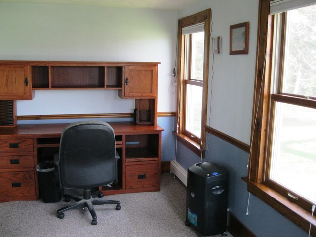 8720 Elva Road DeKalb, IL 60115 - Photo 5 of 25 a view of a workspace with furniture and a window
