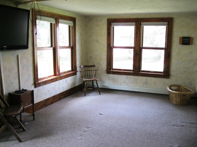 8720 Elva Road DeKalb, IL 60115 - Photo 6 of 25 a living room with furniture and a flat screen tv