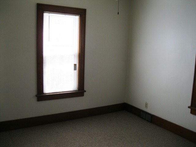 8720 Elva Road DeKalb, IL 60115 - Photo 9 of 25 an empty room with a window
