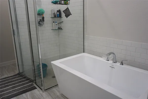 a bathroom with a white tub