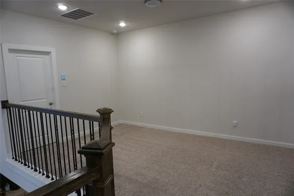 a view of hallway with a window