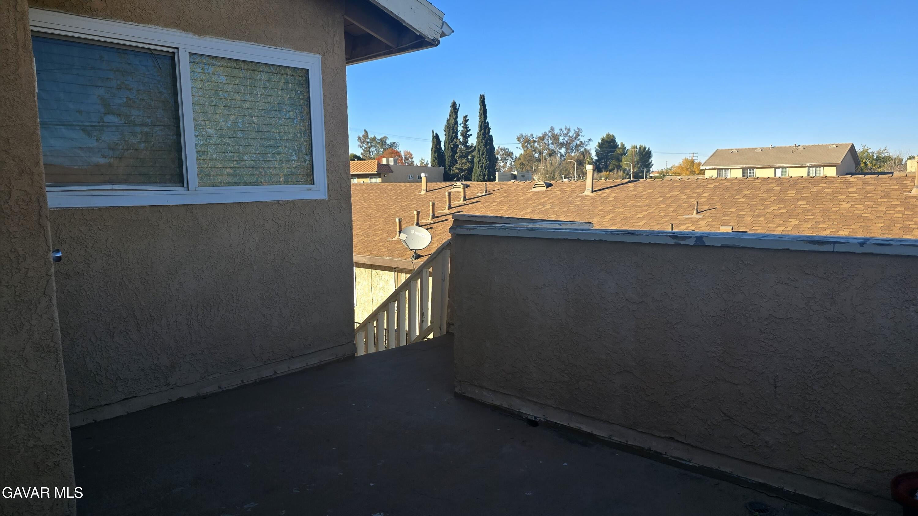 38551 10th Place East, Unit A Palmdale, CA 93550 - Photo 6 of 18 a view of swimming pool from a balcony